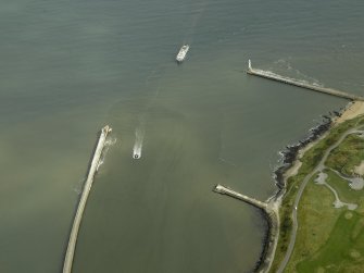 Oblique aerial view centred on the North pier and South breakwaters, taken from the WSW.