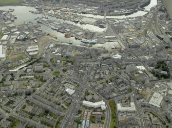 Oblique aerial view centred on the harbour, taken from the NNW.