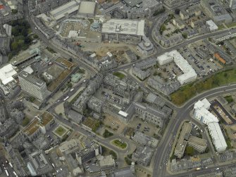 Oblique aerial view of the city centre centred on Marischal College, taken from the ESE.