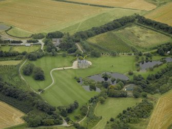 Oblique aerial view centred on Menie House, taken from the WSW.