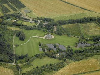 Oblique aerial view centred on Menie House, taken from the SW.