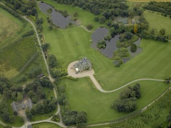 Oblique aerial view centred on Menie House, taken from the NNW.