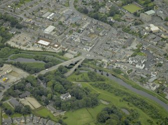 Oblique aerial view centred on the old and new bridges, taken from the ESE.