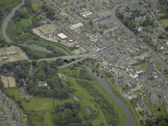 Oblique aerial view centred on the old and new bridges, taken from the E.