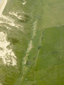 Oblique aerial view centred on the remains of part of the anti-tank line, taken from the W.