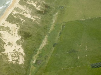 Oblique aerial view centred on the remains of part of the anti-tank line, taken from the W.