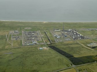 General oblique aerial view centred on the gas terminal, taken from the W.