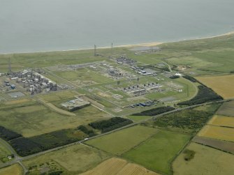 General oblique aerial view centred on the gas terminal, taken from the W.