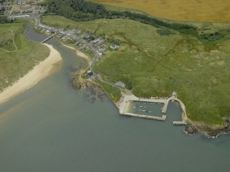 Oblique aerial view centred on the harbour with Port Errol adjacent, taken from the SSW.