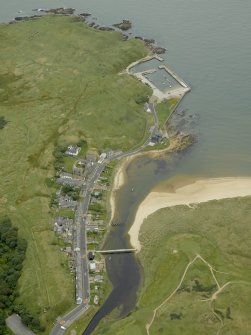 General oblique aerial view centred on the harbour with Port Errol adjacent, taken from the NE.