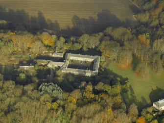 Oblique aerial view centred on the stable block, taken from the SSW.