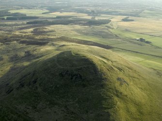 Oblique aerial view centred on the remains of the fort, taken from the N.