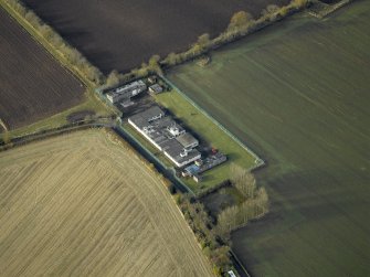 Oblique aerial view centred on the radar station, taken from the ESE.