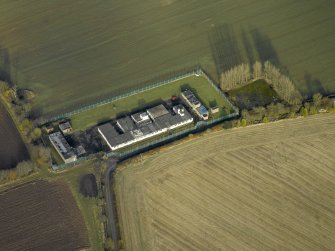 Oblique aerial view centred on the radar station, taken from the SSW.