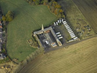 Oblique aerial view centred on the steading, taken from the SE.