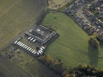 Oblique aerial view centred on the steading, taken from the N.