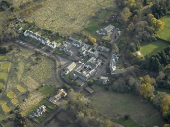 Oblique aerial view centred on the home farm, taken from the NNW.