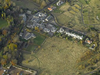 Oblique aerial view centred on the home farm, taken from the SSE.