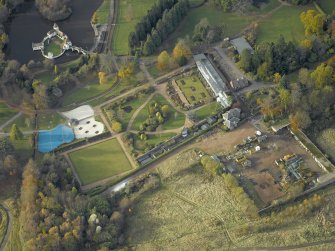 Oblique aerial view centred on the walled garden, taken from the ESE.
