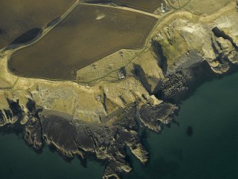 Oblique aerial view centred on the remains of the battery, taken from the S.