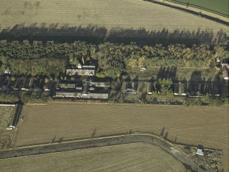Oblique aerial view centred on the central portion of the former hospital, taken from S.
