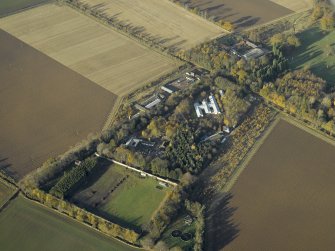 Oblique aerial view centred on the recreation area of the airfield with Gilmerton House adjacent, taken from the SE.