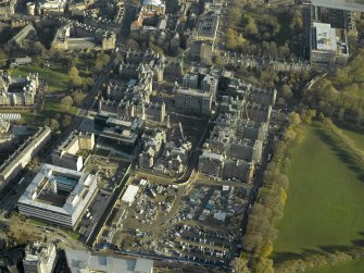 Oblique aerial view centred on the Quartermile development of the former Infirmary, taken from the W.