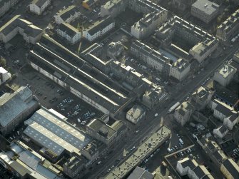 Oblique aerial view centred on the former tramway depot and office, taken from the N.
