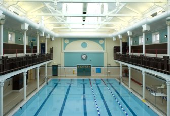 Interior. View of main pool from gallery to N