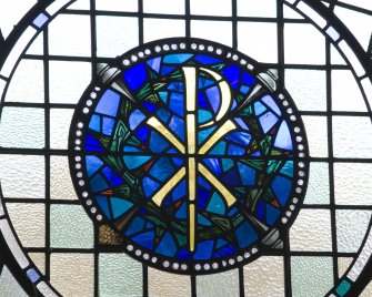 Interior. Detail of roundel of stained glass