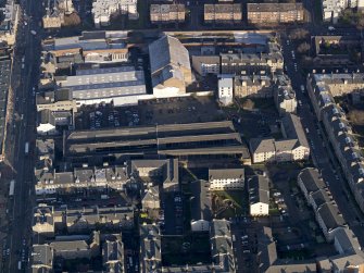 Oblique aerial view centred on the former tramway depot, taken from the SSE.
