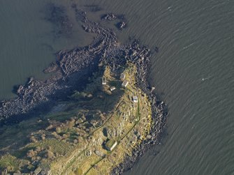 Oblique aerial view centred on the coast batteries at E end, taken from the NW.