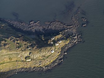 Oblique aerial view centred on the coast batteries at E end, taken from the SW.