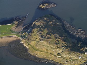 Oblique aerial view centred on the coast batteries at E end, taken from the S.