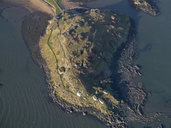 Oblique aerial view centred on the coast batteries at E end, taken from the E.