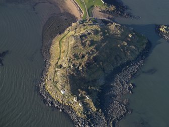 Oblique aerial view centred on the coast batteries at E end, taken from the E.