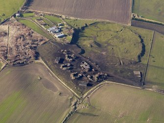 Oblique aerial view centred on the remains of the anti-aircraft battery, taken from the E.