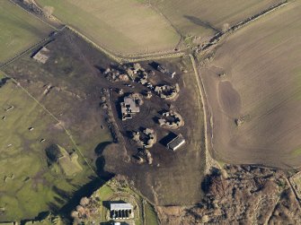 Oblique aerial view centred on the remains of the anti-aircraft battery, taken from the WSW.