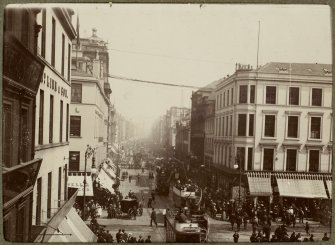 View of procession through Glasgow city centre during 1901 International Exhibition.
