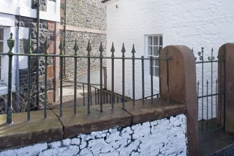 Stable court gate and railings.