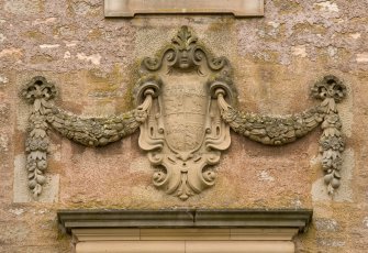 Detail of armourial panel over original entrance