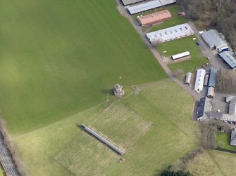 Oblique aerial view centred on Oswald's Temple, taken from the WSW.