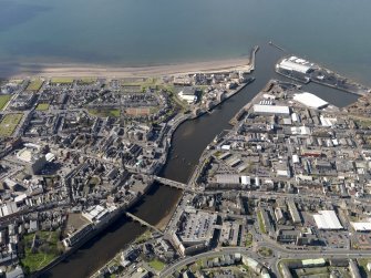 General oblique aerial view centred on the town, taken from the E.