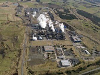 Aerial view centred on the petrochemical complex, taken from the W.