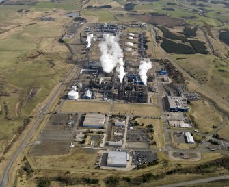 Aerial view centred on the petrochemical complex, taken from the WSW.