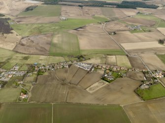 General oblique aerial view centred on the village, taken from the S.