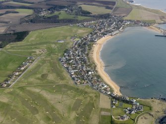 General oblique aerial view centred on the golf course with the villages adjacent, taken from the SW.