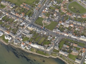 General oblique aerial view of the village centred on Rankeillor Street, taken from the SE.