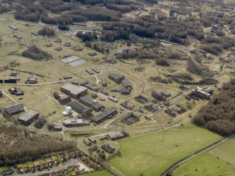 Oblique aerial view centred on the northern section of the explosives factory, taken from the NE.