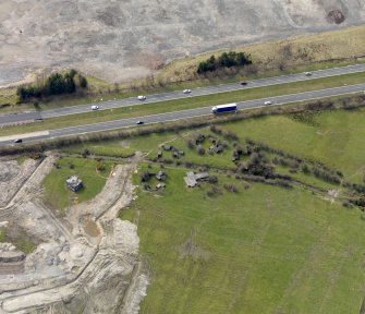 Oblique aerial view centred on the heavy anti-aircraft battery, taken from the NNE.